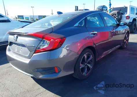 2017 Honda Civic Touring из США, поврежденный, VIN 2HGFC1F98HH659062